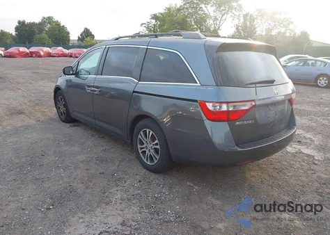 2012 Honda Odyssey Ex-L z USA, uszkodzony, nr VIN 5FNRL5H60CB043795